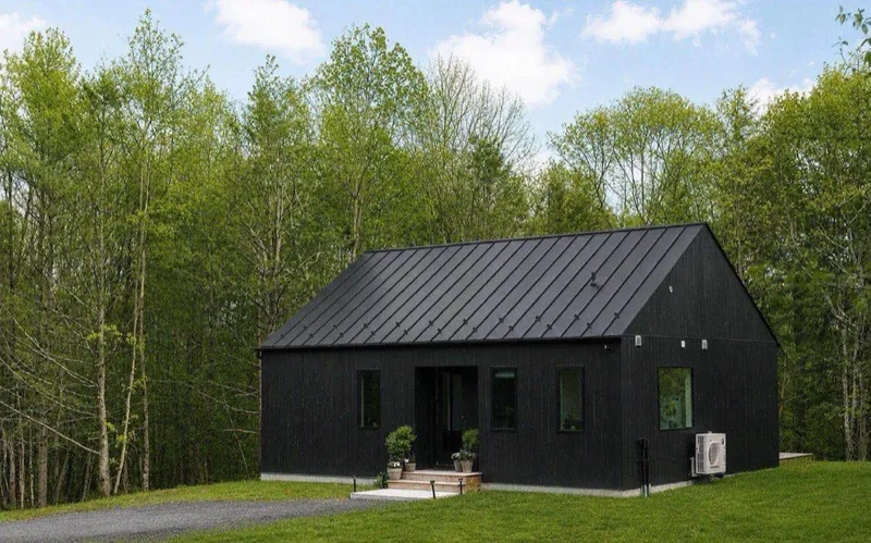 Black metal roof barndominium (sample photo)