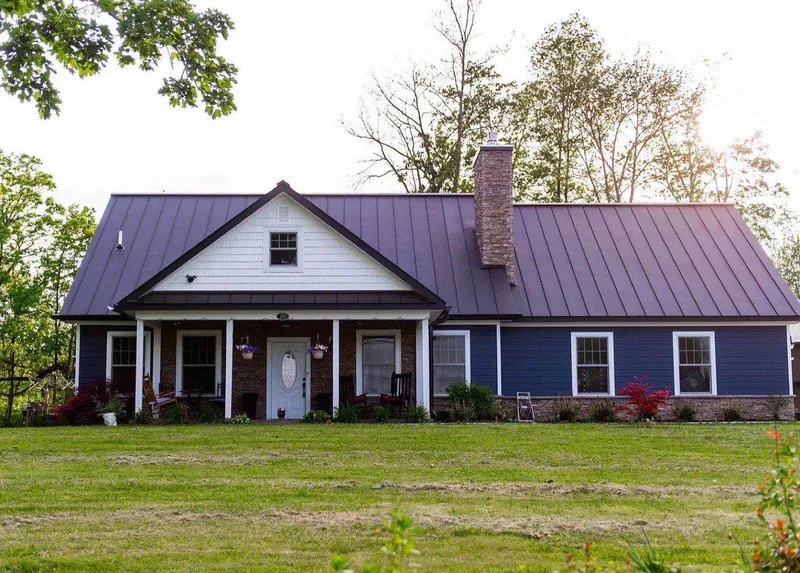 Metal roof cape cod home (sample photo)